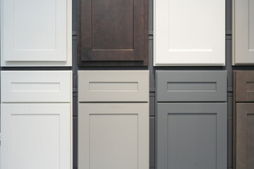 wood cabinet door samples displayed on the wall