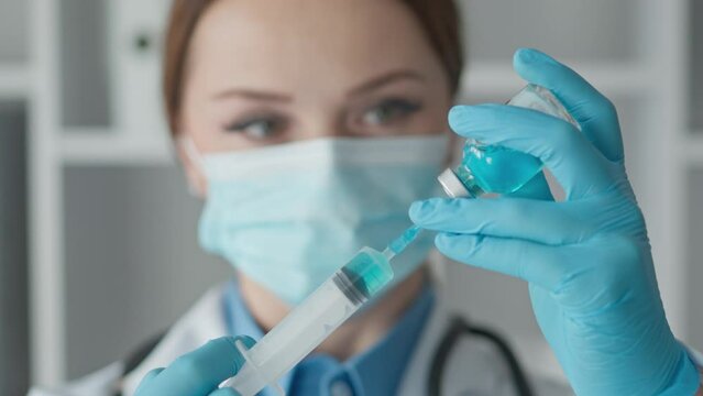 A medical researcher holding a syringe with a new vaccine prepares for the clinical trial phase, examining the potential benefits and risks. The pharmacist readily inserts the syringe into a sterile
