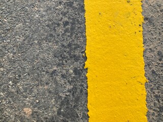 yellow asphalt texture. yellow line on asphalt
