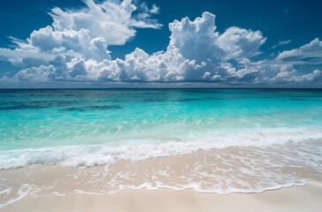 Fototapeta premium Panoramic view of a sandy beach with clear turquoise water and a blue sky with clouds. Summer vacation and travel concept. Design for poster, advertisement, banner with copy space.