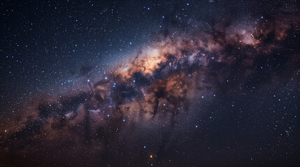 Obraz premium The sky is filled with stars and the Milky Way