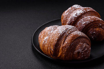 Delicious fresh sweet crispy croissant with chocolate