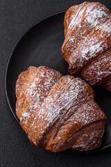 Delicious fresh sweet crispy croissant with chocolate