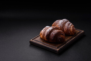 Delicious fresh sweet crispy croissant with chocolate