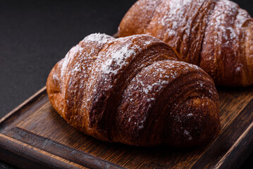 Delicious fresh sweet crispy croissant with chocolate