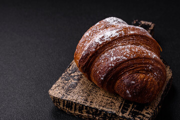 Delicious fresh sweet crispy croissant with chocolate