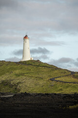 Reykjanes Lighthouse in Iceland with on the hill of peninsula. Landscape scenery.vertical banner