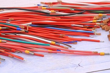 Copper electrical wiring wires in colored insulation for connecting electrical equipment. Close-up....