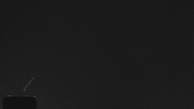 Vintage looping film strip background. Super 8 mm Film grain Dust and Scratches. Retro template. Video tape texture overlay with scratches and smudges	