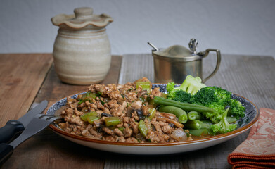 Turkey minced meat with vegetables and a gravy.