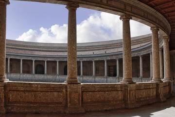 The Circular Patio of the Palace of Charles V is a testimony to the harmonious fusion of...