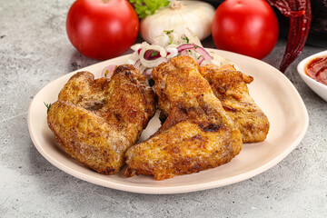 Grilled chicken wings with sauce