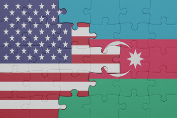 puzzle with the colourful national flag of azerbaijan and flag of united states of america .