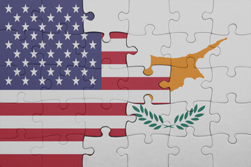 puzzle with the colourful national flag of cyprus and flag of united states of america .