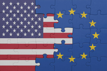 puzzle with the colourful national flag of european union and flag of united states of america .