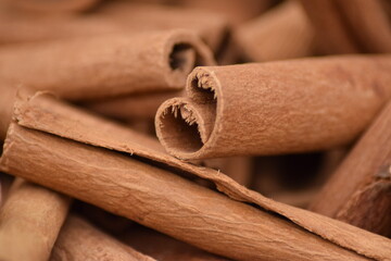 Cinnamon sticks background design pattern