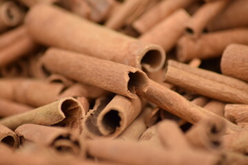 Cinnamon sticks background design pattern