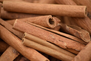 Cinnamon sticks background design pattern