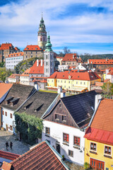 Obraz premium Cesky Krumlov historic center aerial view. Cesky Krumlov, historic center aerial view with cathedral tower, Czech Republic 
