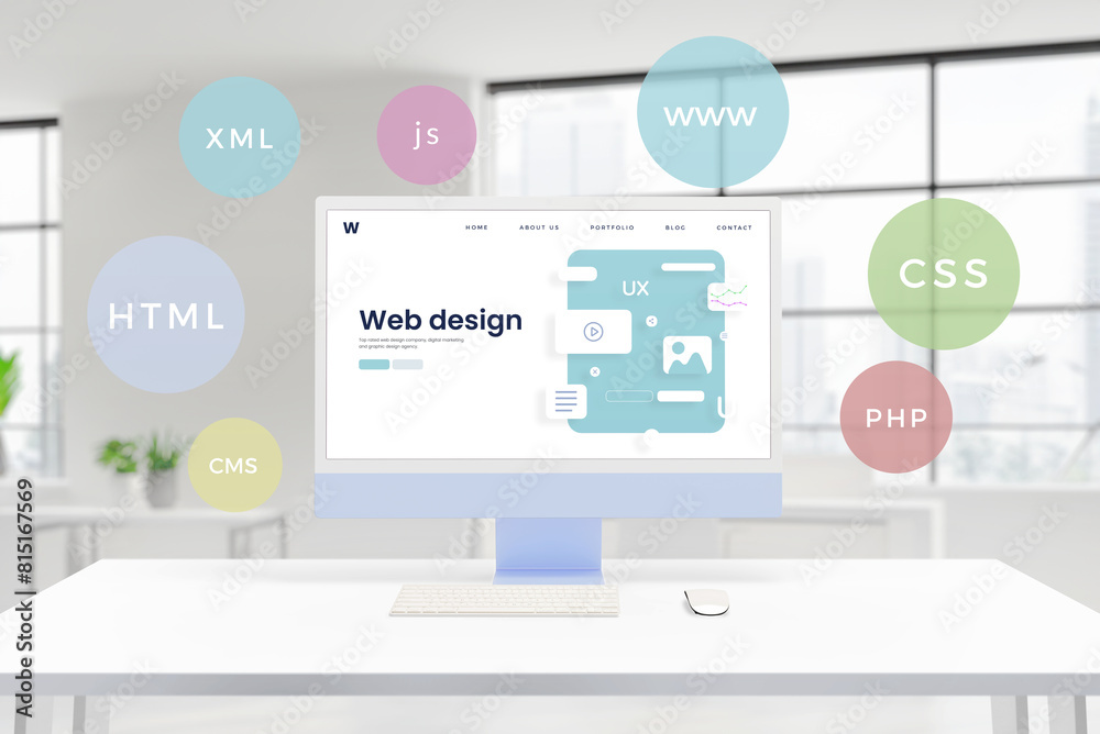 Fototapete Computer display showcases a conceptual web design studio page with layout elements. Floating balloons feature HTML, PHP, CSS, XML, JS, CMS technologies