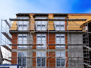 scaffolding on a multi-storey building, restoration of the building facade