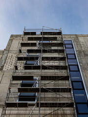 scaffolding on a multi-storey building, restoration of the building facade