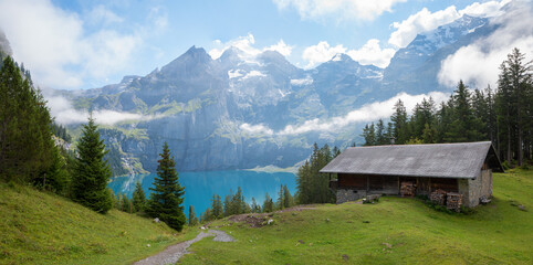 pictorial landscape above lake Oeschinensee, with hut and mountain view