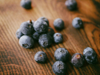 blueberries on wooden background