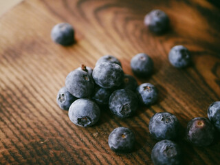 blueberries on wooden background