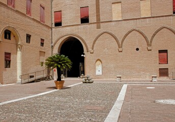 The courtyard of the Estense Castle, (Castello di San Michele), is the most representative monument...