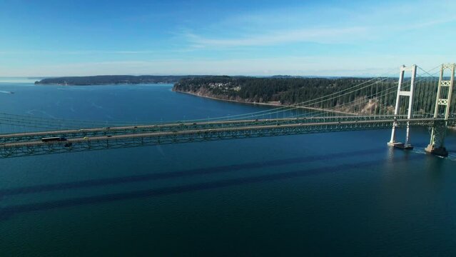 Washington Aerial View Panning Tacoma Narrows Bridge Over Blue Ocean Water