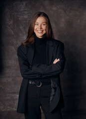 Beautiful girl in jacket on canvas background without makeup