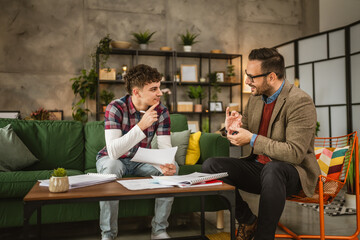 Adult professor mentor explain young student lesson at home