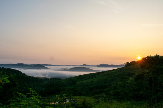 Landscape of clouds and mountains during sunrise at Vagamon. Vagamon, Kerala, India