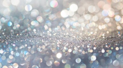 Shiny silver glitter bokeh background. Creative sparkling star dust texture for luxury rich...