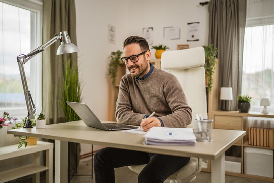 Adult man sit at office have video consultation prepare to sign paper