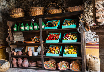 Antique shelves containing: food, drinks and grainsgg