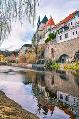 Cesky Krumlov historic center, view of the riverside and the medieval castle. Bohemia, Czech Republic