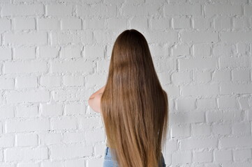 young woman with very long brown hair