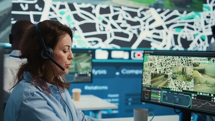 Diverse operators giving updates on order tracking to clients, working with surveillance CCTV...