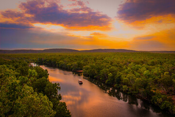 Sunset above the rive and forest