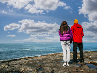Father and teenager daughter on a trip by the ocean. Parent and child activity. Divorced family kid...