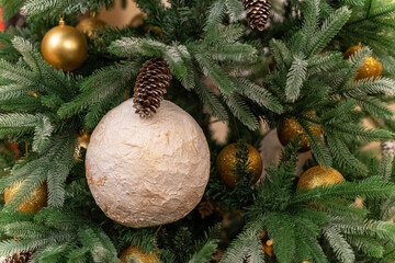 Christmas ball. An egg hanging from a Christmas tree decoration.