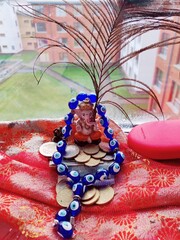 Fototapeta premium Close-up of decoration near Ganesha Idol