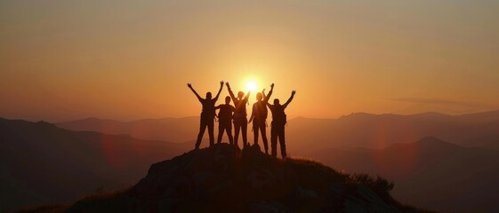 Silhouette of group happy business team making high hands over head in beautiful sunset sky evening time for business success and teamwork concept in company. International Friendship Day.