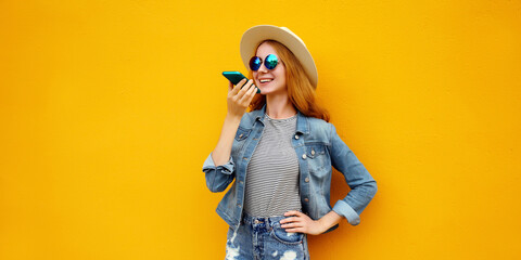 Young woman holding talking on the phone, using voice command recorder, assistant or takes calling