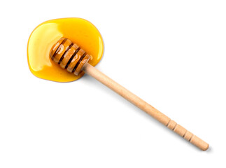 Honey with wooden honey dipper isolated on white background. Spilled honey. Honey Spoon, drizzler, stick. Top view. Flat lay. 