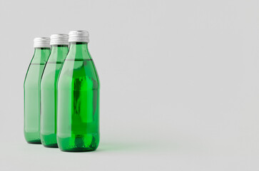 Water bottle mockup. Green glass.