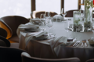Table set for an event party or wedding reception, winter theme