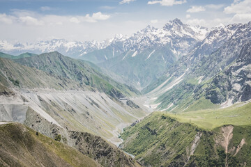 Naklejka premium Mountain panorama landscape in the mountains of Tajikistan on a sunny summer day, view of mountain ranges in the highlands